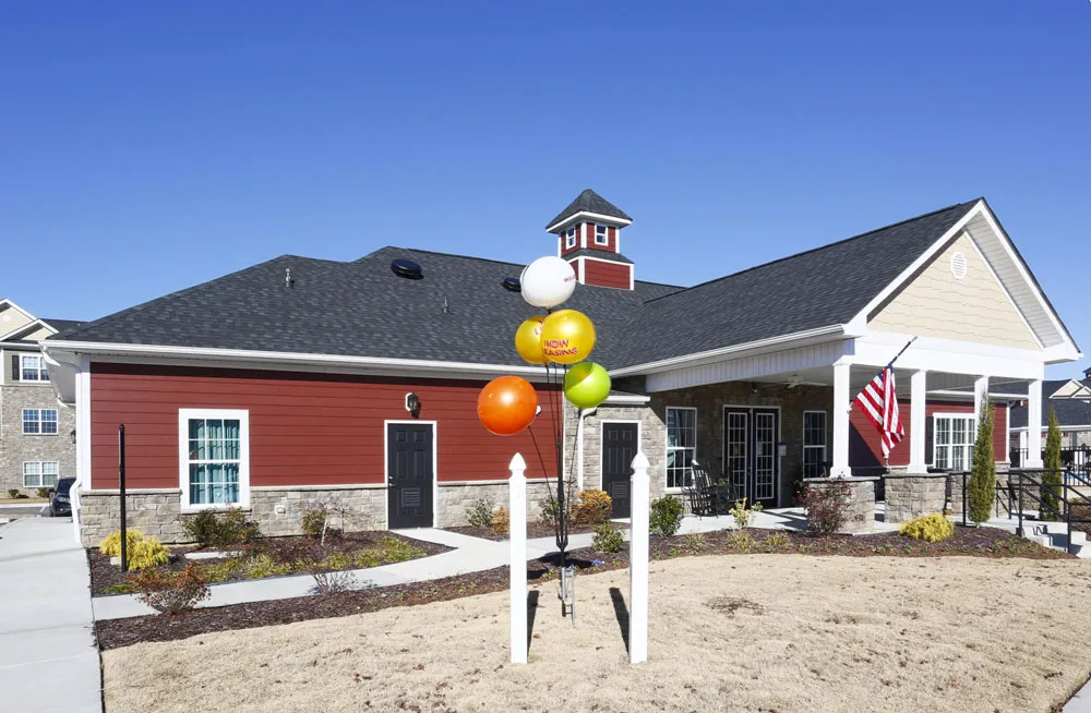 Community clubhouse entrance at Villas at Regal Manor apartment community in Fort Mill, South Carolina